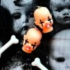 Beheaded Baby Doll Head Earrings